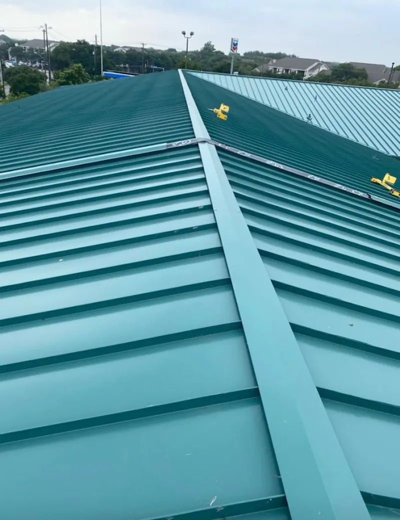 Green commercial metal roof ridge and valley for Metal Roof Repair in Mansfield